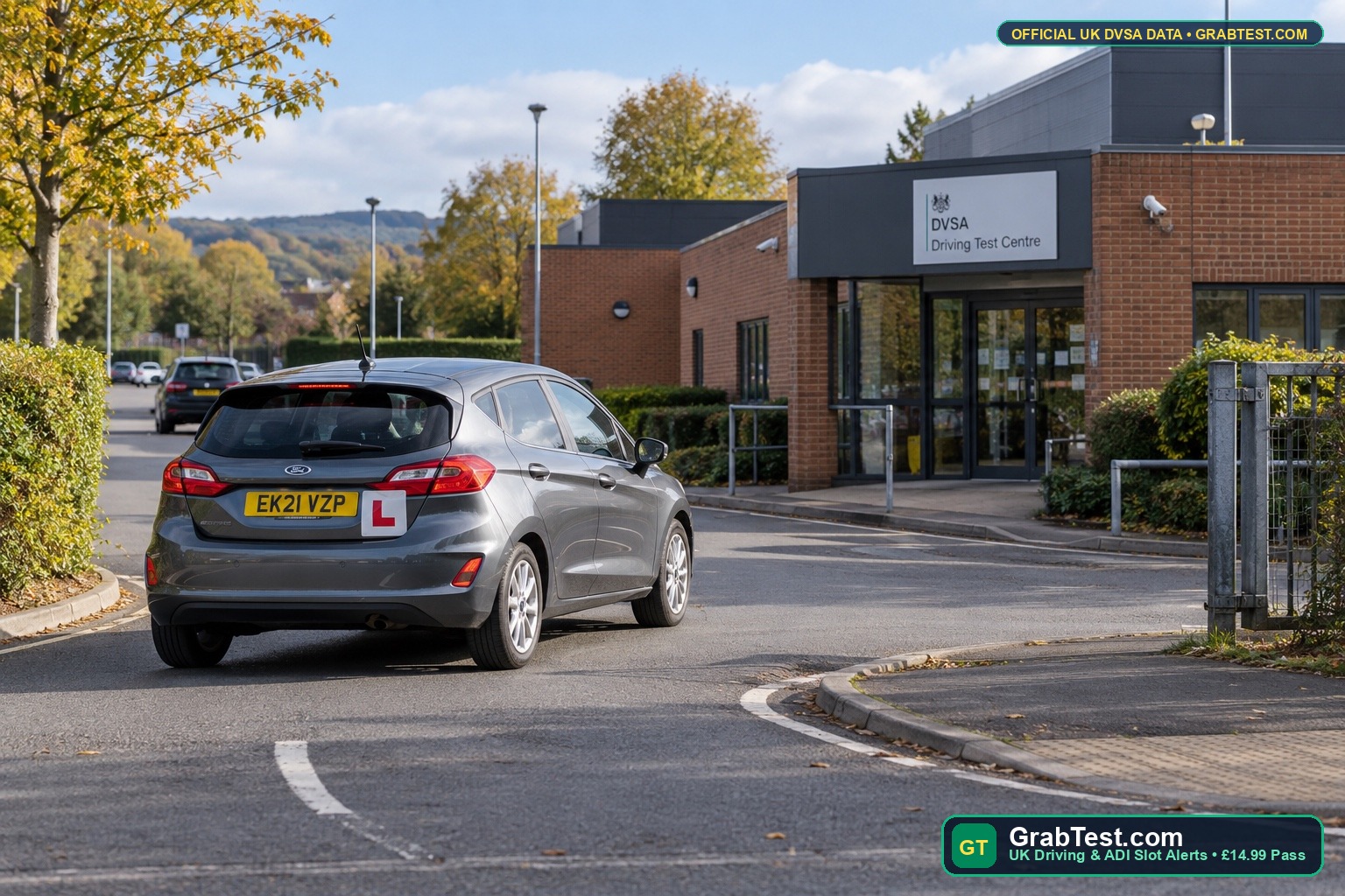 UK learner car arriving at a Yorkshire DVSA Driving Test Centre in morning daylight - GrabTest.com UK Driving & ADI Slot Alerts